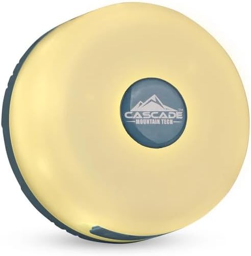 Yellow exercise ball with a blue circular logo featuring 'Cascade Mountain Tech' on a white background