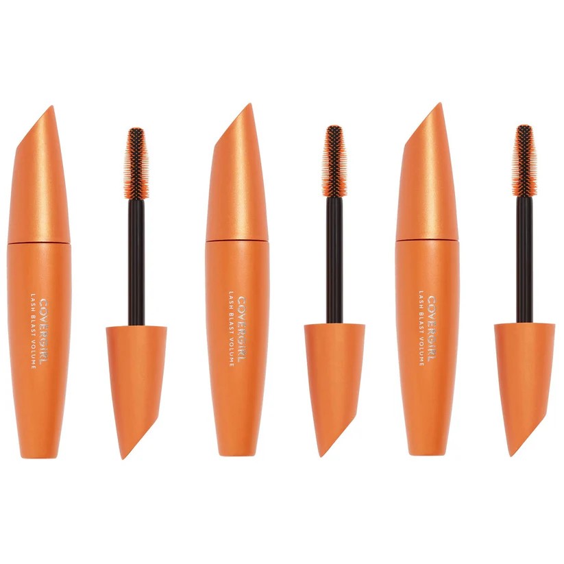 Six tubes of Covergirl Water Light Volume Mascara shown in a row, with two tubes open to reveal the black applicator brushes. The packaging is a metallic copper-orange color with white text, set against a plain white background.