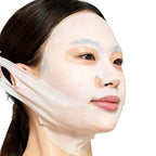 Woman applying a face mask with a white background