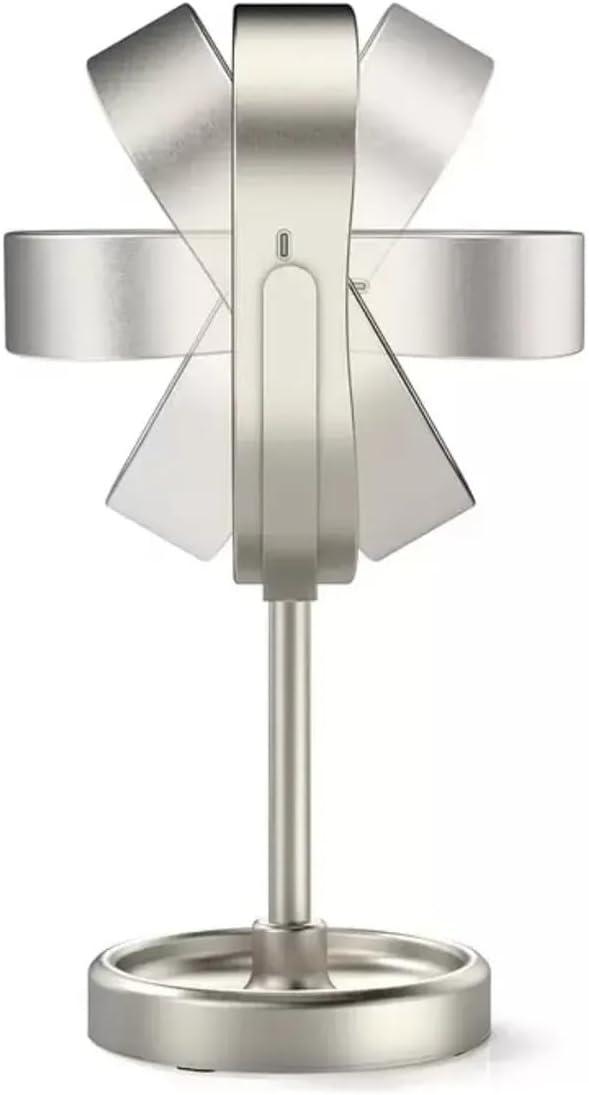Modern silver table lamp with geometric design on a white background