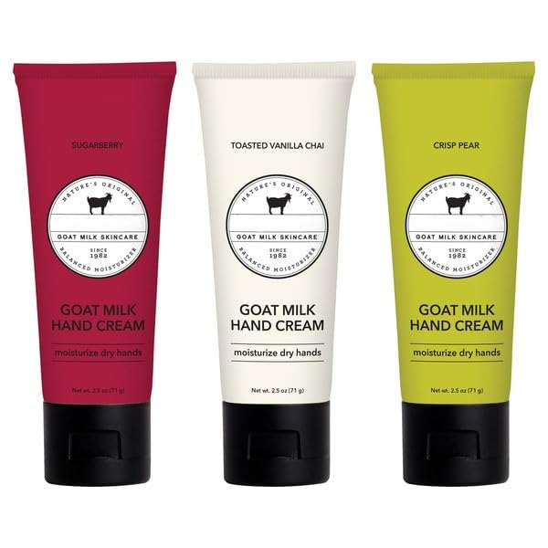 Three tubes of Dionis Goat Milk Hand Cream in different flavors on a white background.