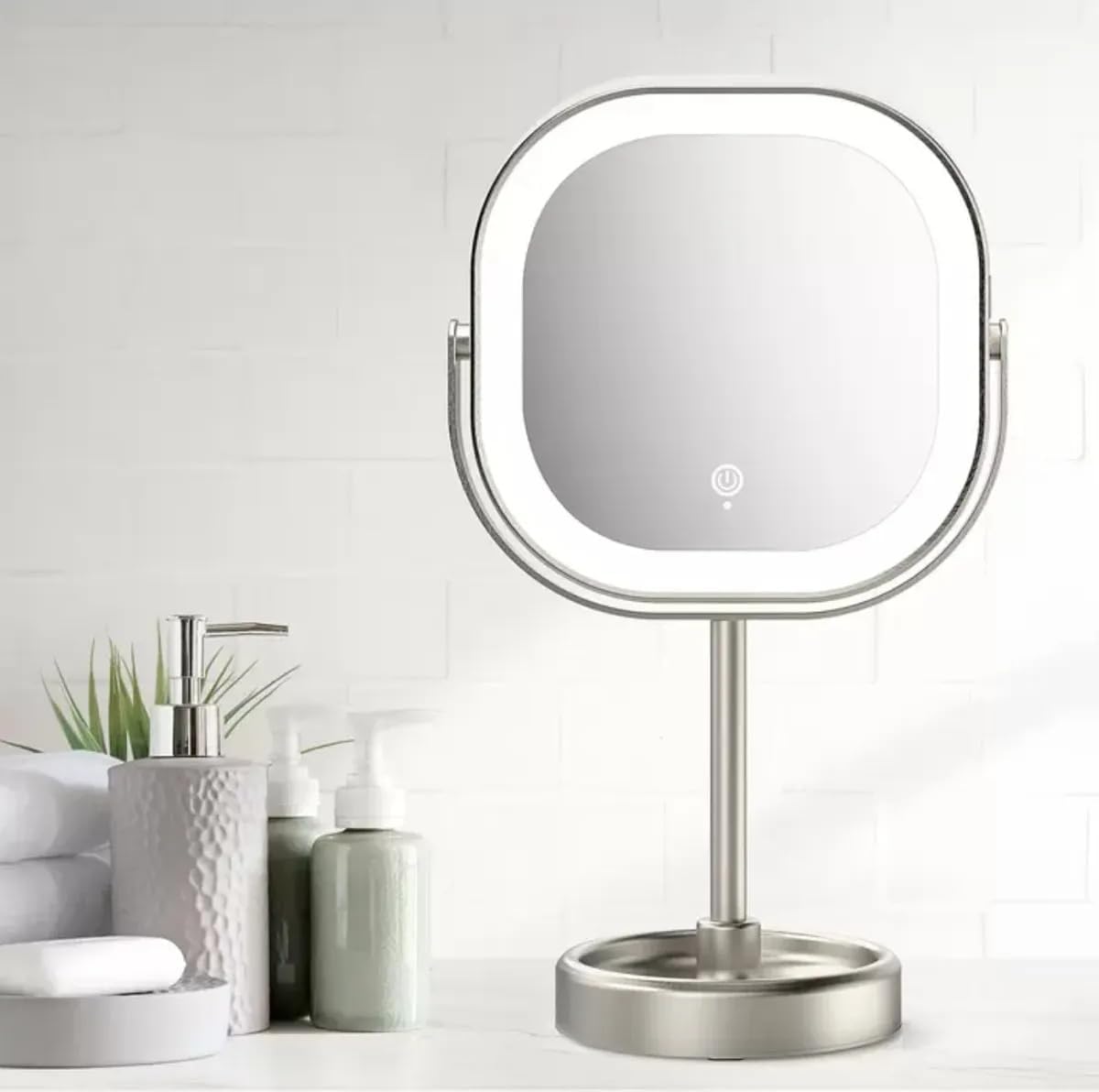 Makeup mirror with LED lights on a white surface