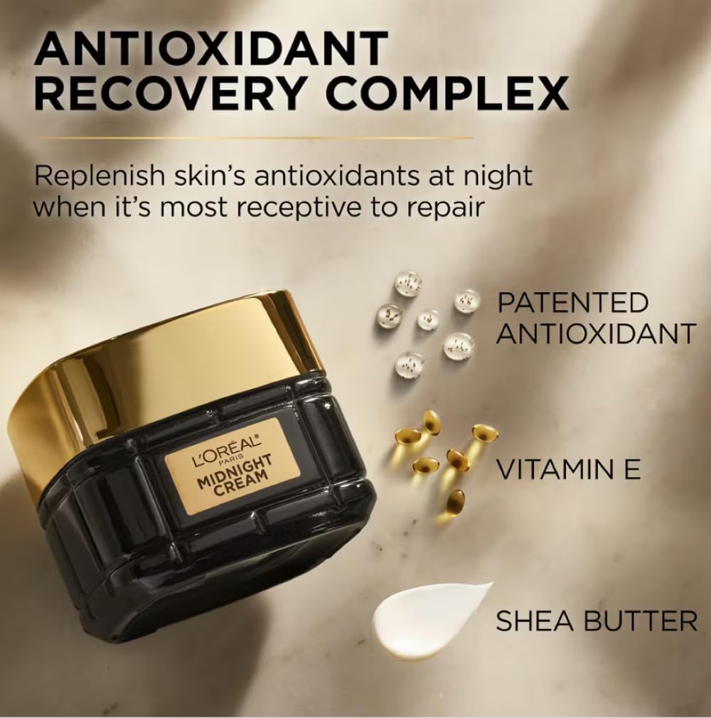 L'Oreal Midnight Cream with ingredients on a beige background