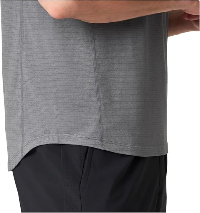 Gray athletic shirt and black shorts on a white background