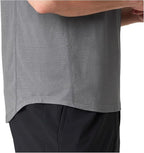 Gray athletic shirt and black shorts on a white background