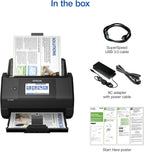 Epson scanner with accessories including a USB cable, power adapter, and start here poster.