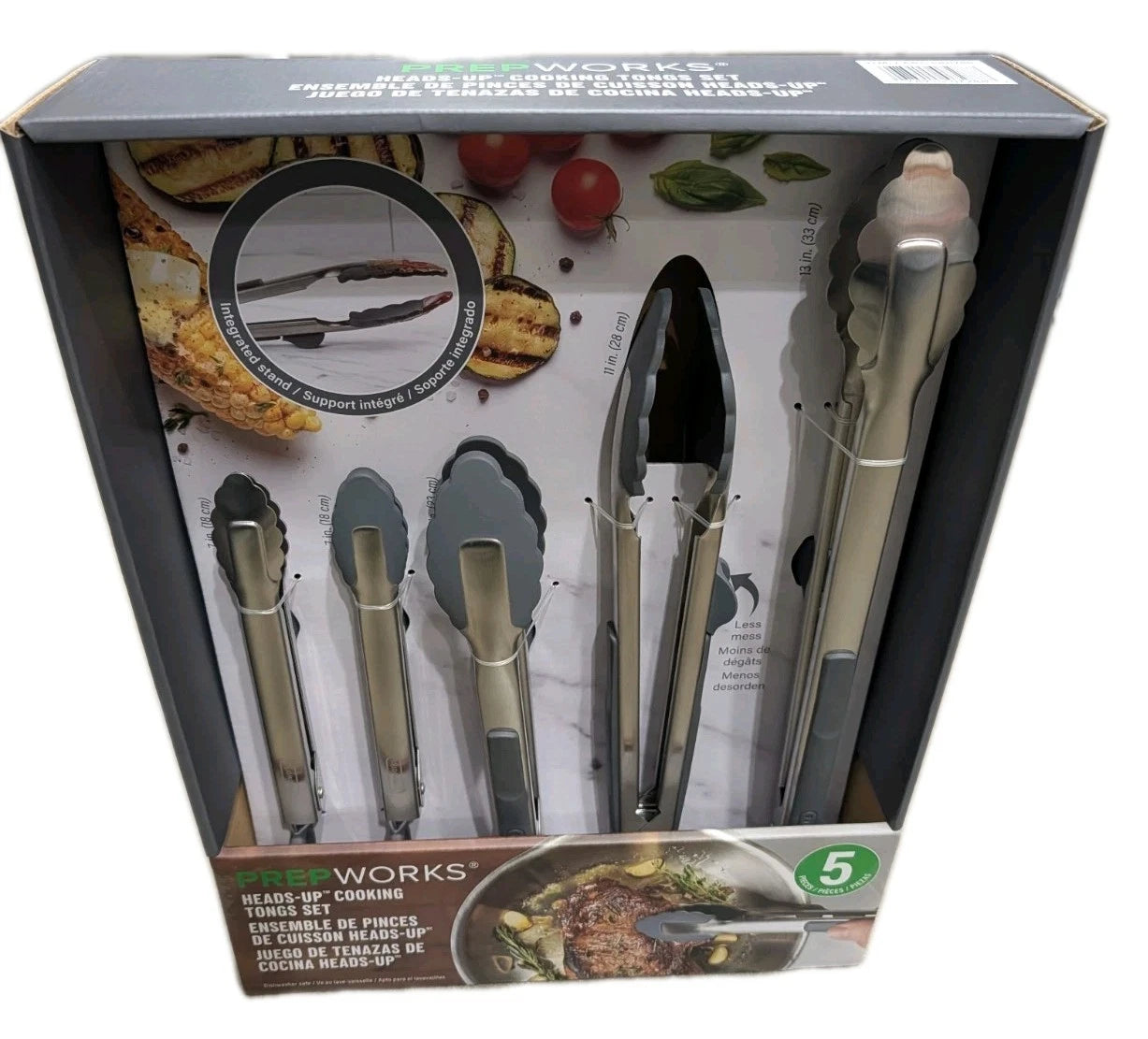 Boxed set of Five Works kitchen utensils with tongs and spatulas on a white background