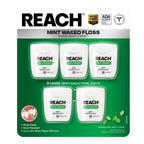 Packaging of Reach mint waxed floss with branding and product details on a white background.