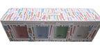 Bellevue Luxury Candles four 10-ounce soy blend candles in a decorative box with a multicolor geometric pattern and four visible candle color windows.